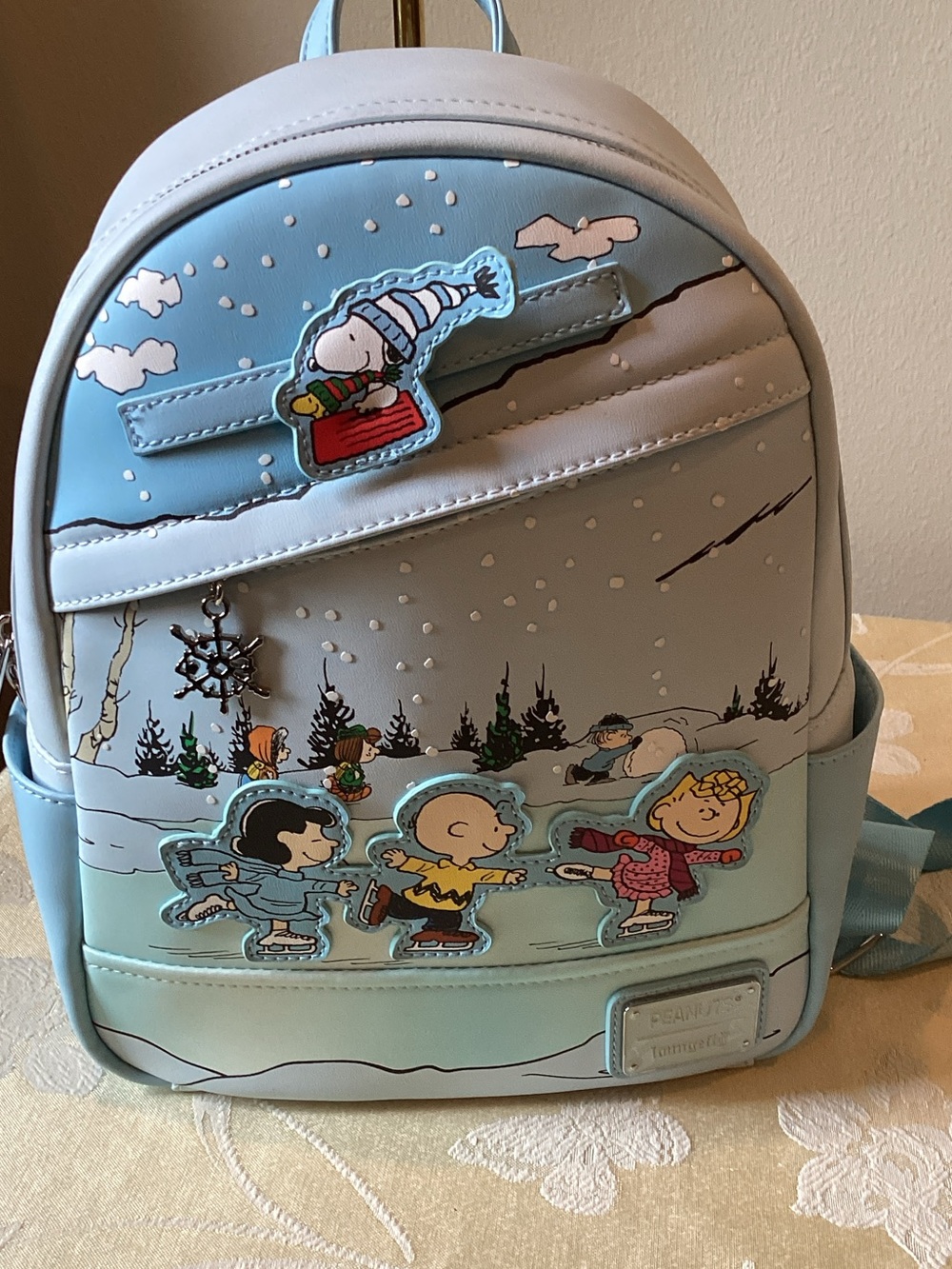 Rare Hard to Find Loungefly Peanuts Charlie Brown Ice Skating Mini Backpack.